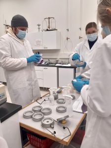 Students are cleaning the Andersen sampler.