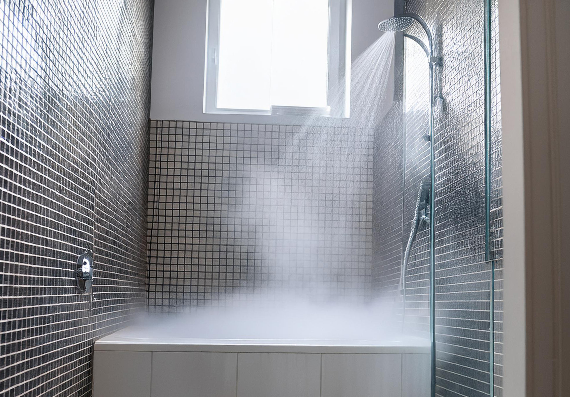 Suihku Kuva Muokattu In the picture, steam is being generated in the shower.