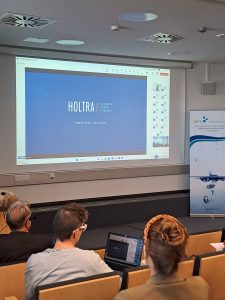 Fredrik Eklund, CEO of Holtra AB, appeared via Teams.