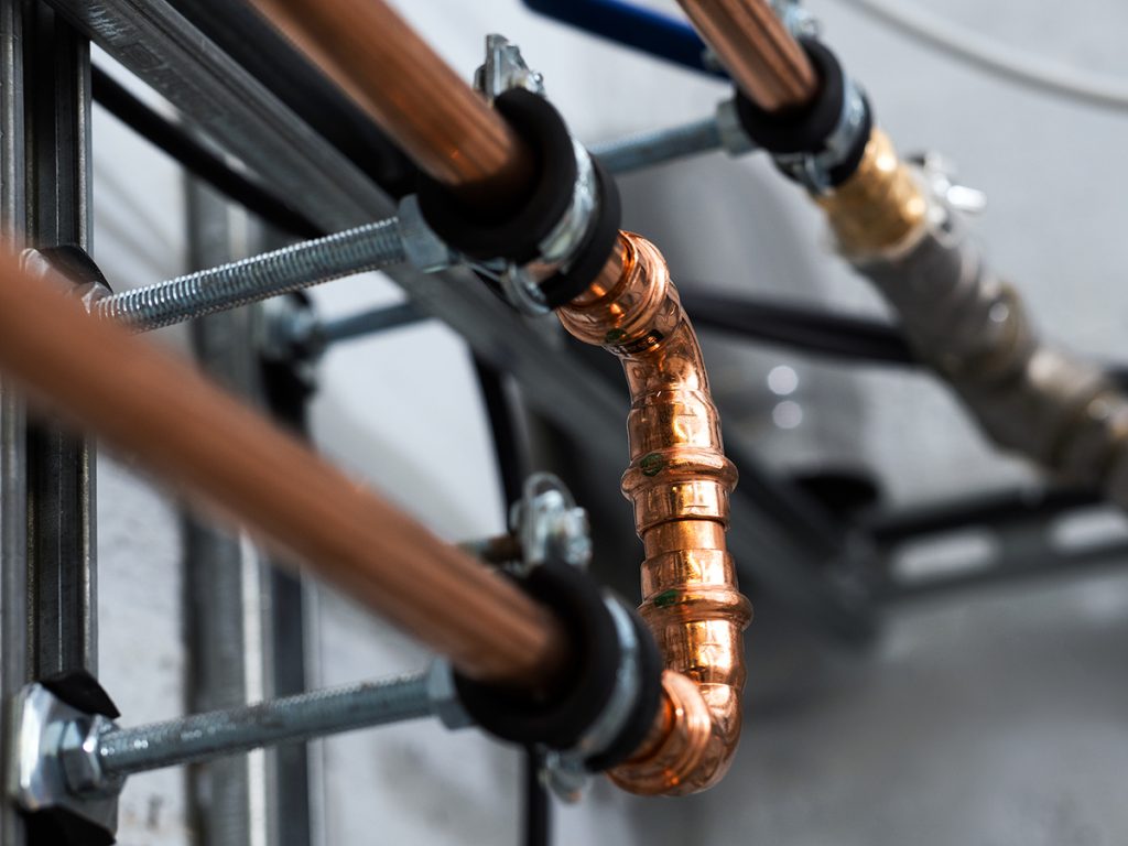 Closeup of copper pipe.